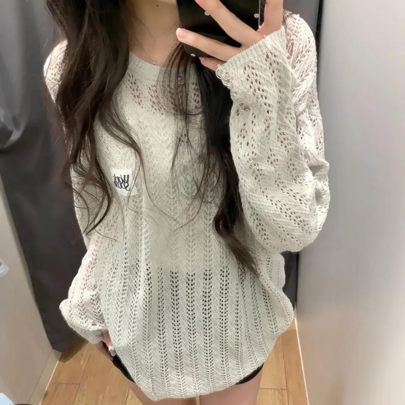 White hollow knitted sweater women's loose sunscreen blouse thin breathable anti-top
White hollow knitted sweater women's loose sunscreen blouse thin breathable anti-top