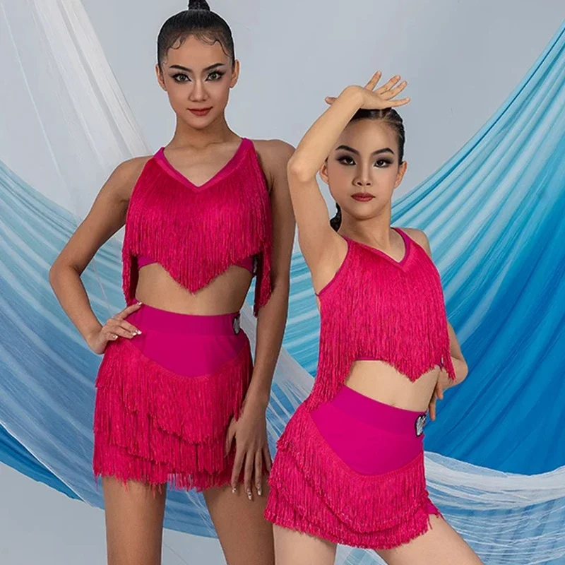 Костюм для латинских танцев для женщин и девочек, топы с кисточками на шее, юбка, ча-ча, румба, самба, танцевальная одежда для практики, DNV19652
Костюм для латинских танцев для женщин и девочек, топы с кисточками на шее, юбка, ча-ча, румба, самба, танцевальная одежда для практики, DNV19652