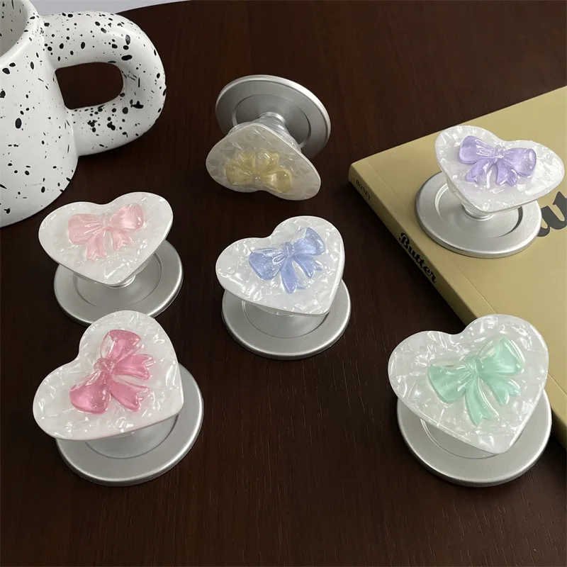 Ins Jelly Bow New Suitable for MagSafe Magnetic Suction Bracket Super Adsorption Force Retractable Desktop Airbag for IPhone 17
Ins Jelly Bow New Suitable for MagSafe Magnetic Suction Bracket Super Adsorption Force Retractable Desktop Airbag for IPhone 17