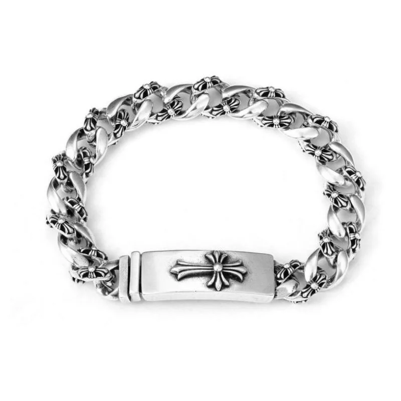 Intricate Cross-Embossed Silver Bracelet - Cuban Link Detail Accessory
Intricate Cross-Embossed Silver Bracelet - Cuban Link Detail Accessory