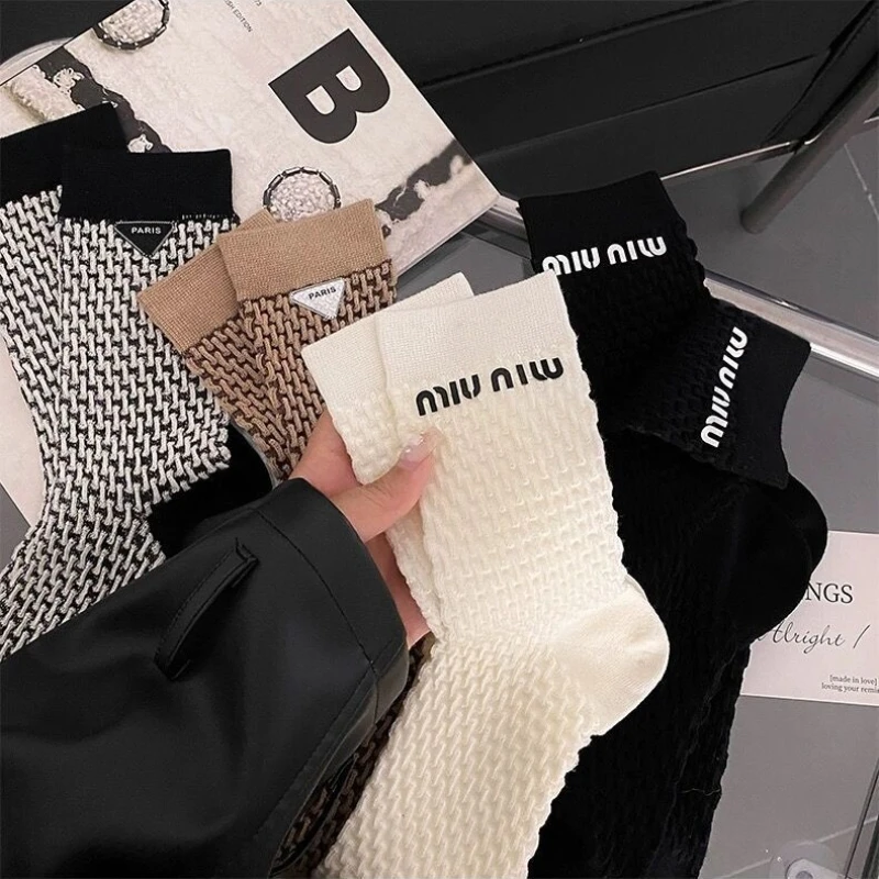 Uniquely designed, personalized, black lettered, women's fashionable, versatile, and trendy socks for outerwear
Uniquely designed, personalized, black lettered, women's fashionable, versatile, and trendy socks for outerwear