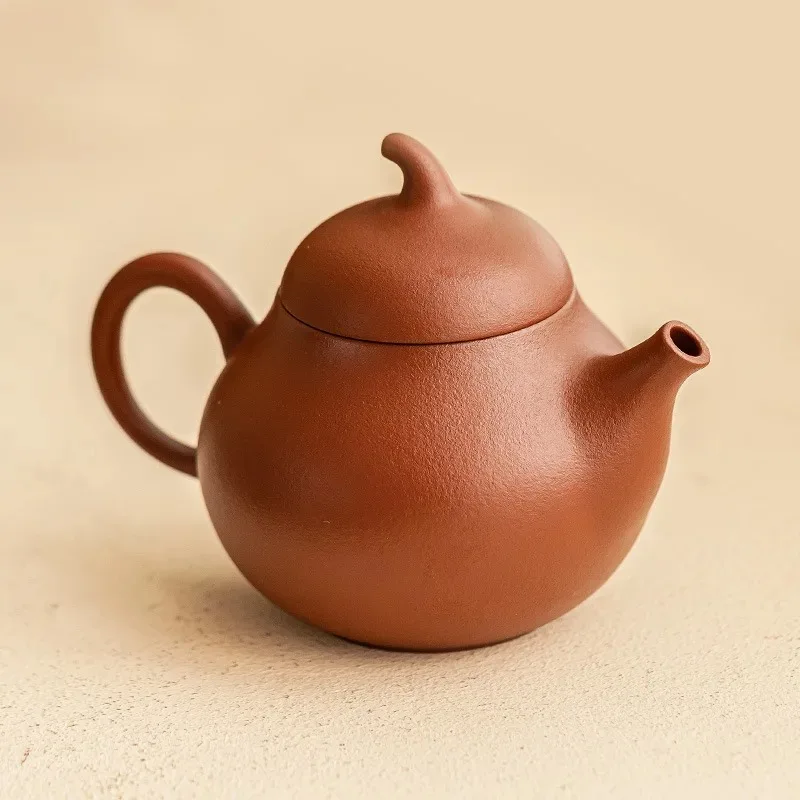 Yixing Zhu Mud Purple Sand Pear-shaped Pot Is Not Hot Chinese Kung Fu Tea Set High-end Household Tea Zisha Tea Set Accessories
Yixing Zhu Mud Purple Sand Pear-shaped Pot Is Not Hot Chinese Kung Fu Tea Set High-end Household Tea Zisha Tea Set Accessories