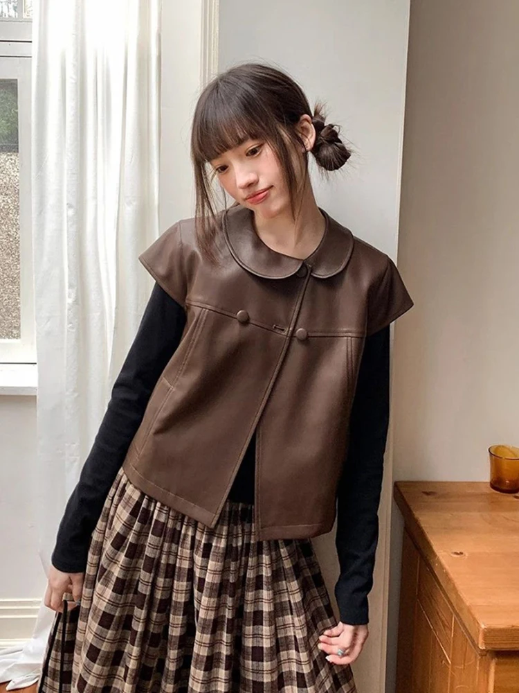 Новая винтажная уличная куртка-жилетка для женщин в стиле кавайи с воротником «Питер Пэн», милая, в стиле преппи, весенняя, повседневная, на пуговицах, из искусственной кожи, Y2K, в стиле Харадзюку
Новая винтажная уличная куртка-жилетка для женщин в стиле кавайи с воротником «Питер Пэн», милая, в стиле преппи, весенняя, повседневная, на пуговицах, из искусственной кожи, Y2K, в стиле Харадзюку