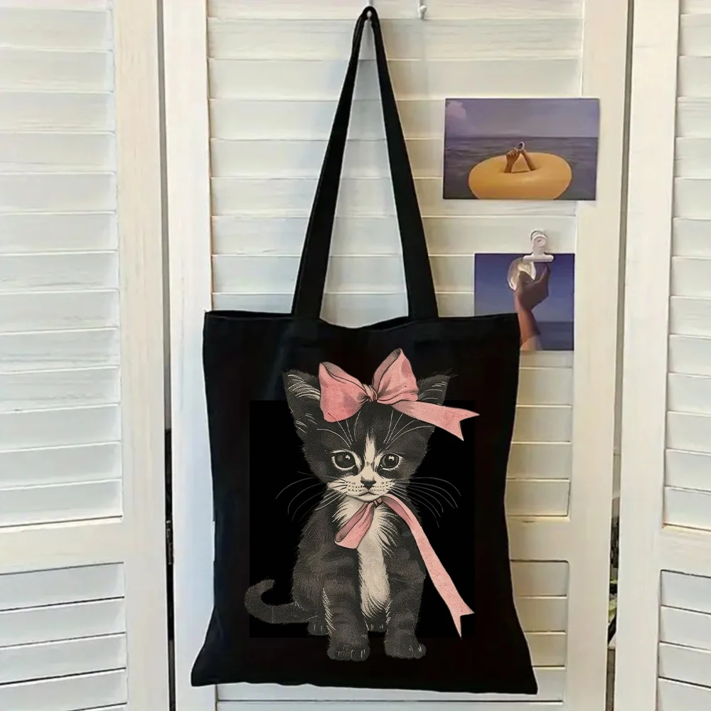 Vintage Kitten With Pink Bow Print Black Canvas Tote Bag, Women Shoulder Bag, Cute Pet Handbag for Retro Style
Vintage Kitten With Pink Bow Print Black Canvas Tote Bag, Women Shoulder Bag, Cute Pet Handbag for Retro Style