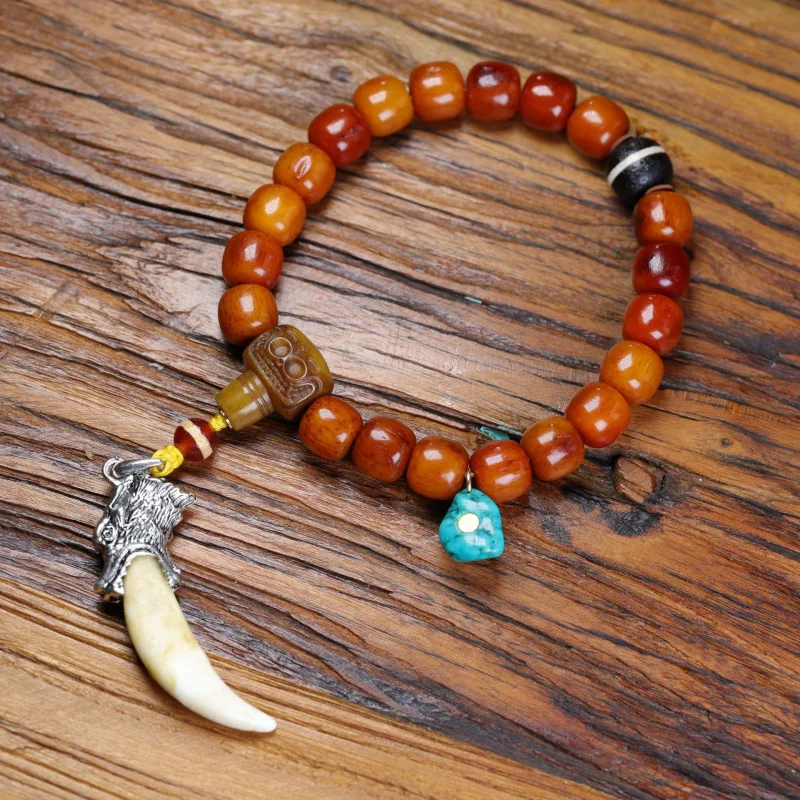 Тибетский стиль браслет из бычьей кости ручной подлинный черный кулон в виде зуба собаки аксессуары
Тибетский стиль браслет из бычьей кости ручной подлинный черный кулон в виде зуба собаки аксессуары