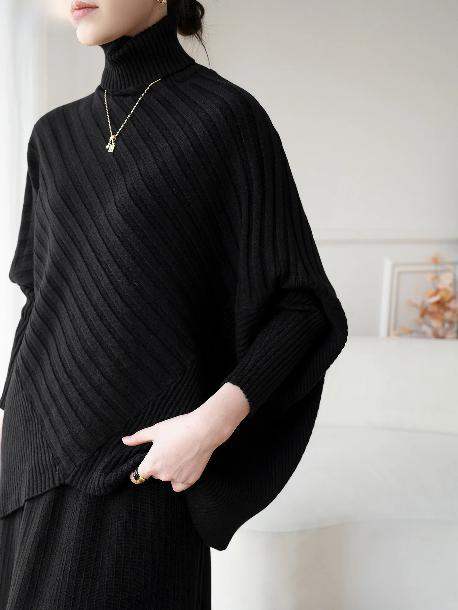 Elegant Black Knitted Set Women's Asymmetrical Batwing Sleeve High Collar Sweater Skirt Two-Piece Suite Fashionable Casu...
Elegant Black Knitted Set Women's Asymmetrical Batwing Sleeve High Collar Sweater Skirt Two-Piece Suite Fashionable Casu...