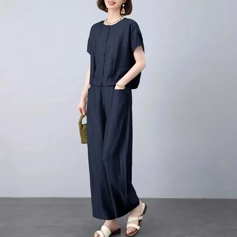 Fashionable Wide Leg Pants Short Sleeve Shirt Two Piece Set for plus Size Women Luxury High End Summer Collection 2026
Fashionable Wide Leg Pants Short Sleeve Shirt Two Piece Set for plus Size Women Luxury High End Summer Collection 2026