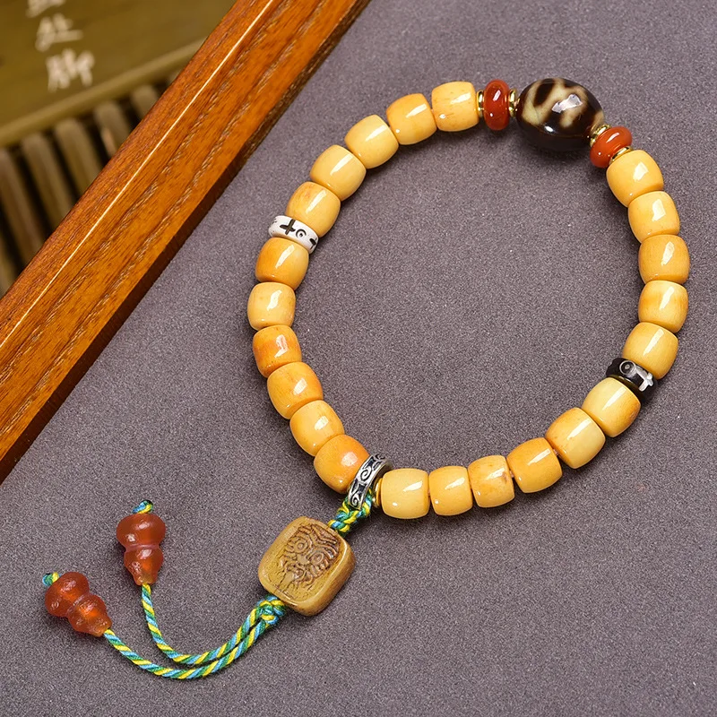 - vintage single- accessories, Tibetan-style Buddhist prayer beads multi-loop bracelet, camel bone
- vintage single- accessories, Tibetan-style Buddhist prayer beads multi-loop bracelet, camel bone