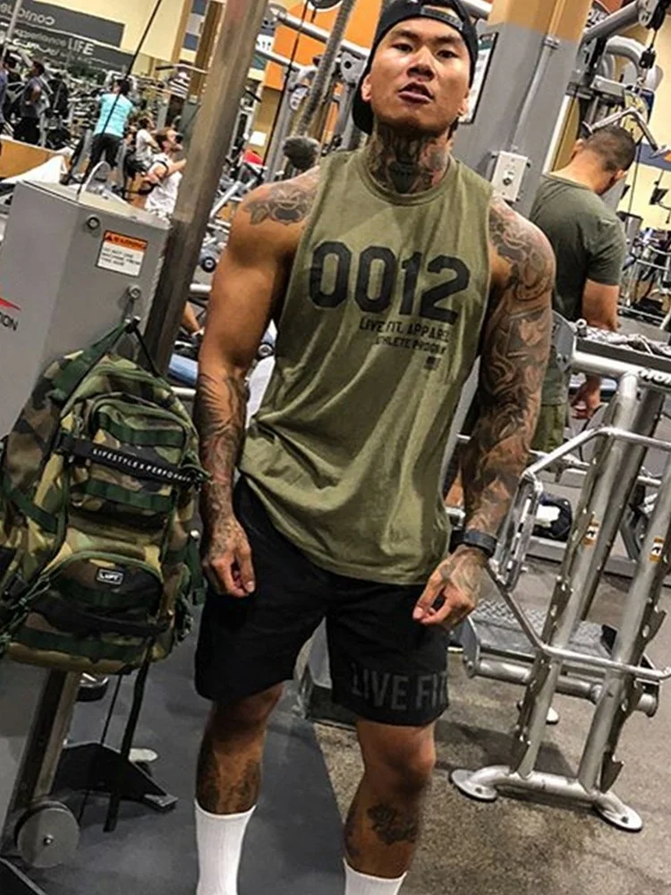 New Men's Sport Vest Tank Top Cotton Fitness Muscle Gym Workout Short Sleeve Breathable Quick Dry Elastic Large Size T-Shirt
New Men's Sport Vest Tank Top Cotton Fitness Muscle Gym Workout Short Sleeve Breathable Quick Dry Elastic Large Size T-Shirt