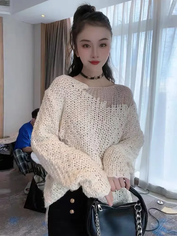Осенний новый женский вязаный свитер с открытыми плечами, свободный длинный свек, повседневная верхняя одежда с эффектом похудения
Осенний новый женский вязаный свитер с открытыми плечами, свободный длинный свек, повседневная верхняя одежда с эффектом похудения