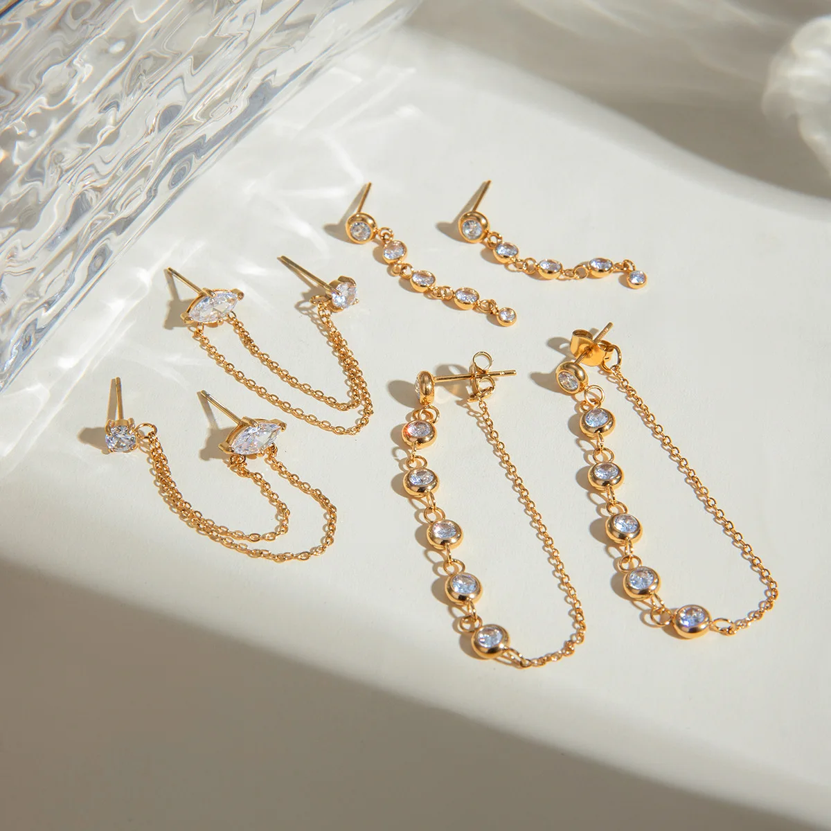 Fashionable and versatile 18K gold stainless steel tassel round zircon earrings for women wholesale
Fashionable and versatile 18K gold stainless steel tassel round zircon earrings for women wholesale