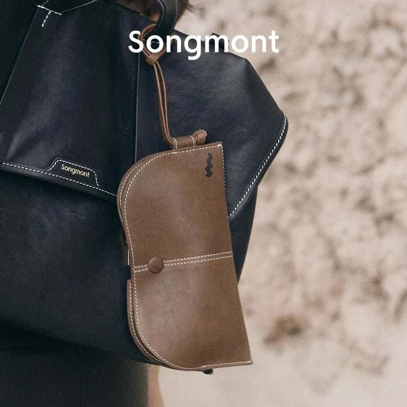 Songmont Trace Bag Pendant Designer Accessories Vegetable-Tanned Leather Eyeglass Case Decorative Bag
Songmont Trace Bag Pendant Designer Accessories Vegetable-Tanned Leather Eyeglass Case Decorative Bag