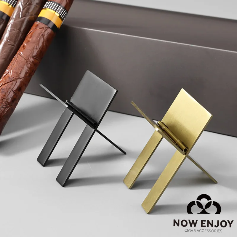 Single portable cigar holder that can be folded and has anti-slip function Simple stainless steel cigar stand Cigar accessories.
Single portable cigar holder that can be folded and has anti-slip function Simple stainless steel cigar stand Cigar accessories.