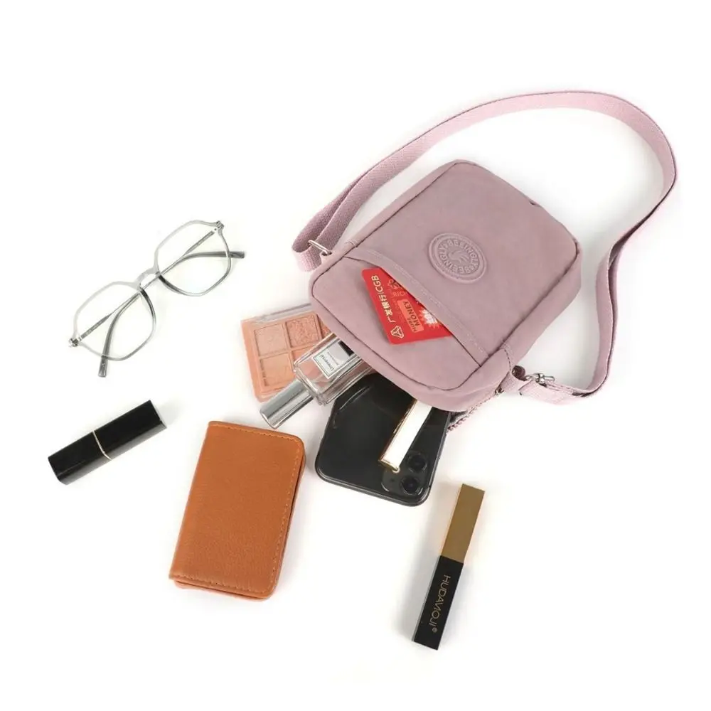 Waterproof Multi-functional Zipper Crossbody Bag Niche Design Nylon Shoulder Bag Solid Color Korean Style Small Phone Bag Girls
Waterproof Multi-functional Zipper Crossbody Bag Niche Design Nylon Shoulder Bag Solid Color Korean Style Small Phone Bag Girls