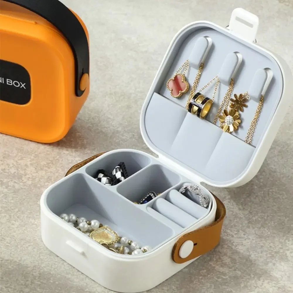 Simple Plastic Silicone Liner Jewelry Box Solid Color Portable Necklace Ring Case Container PU Handle Earring Organizer Girls
Simple Plastic Silicone Liner Jewelry Box Solid Color Portable Necklace Ring Case Container PU Handle Earring Organizer Girls