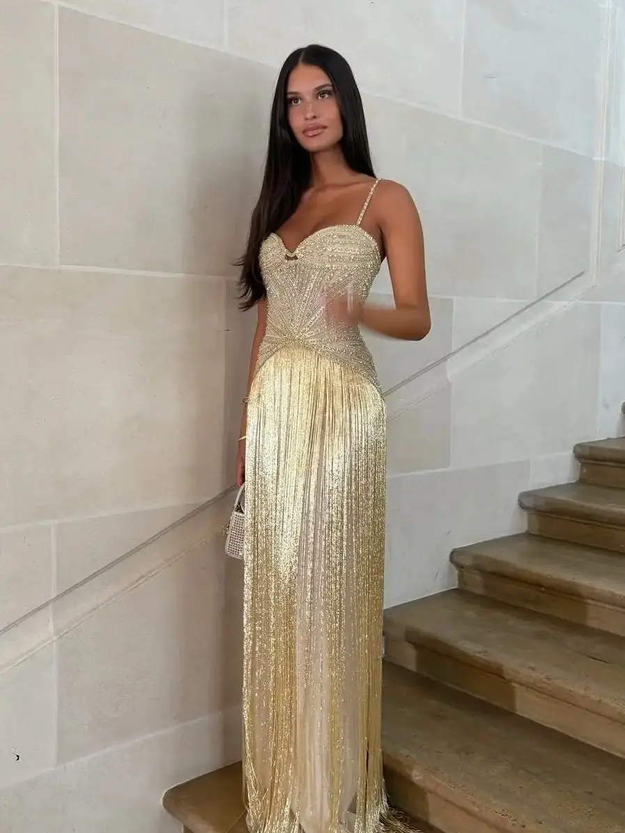 Ofherown Вечернее платье с золотыми пайетками и кисточками 2026 Роскошное платье для выпускного вечера на тонких бретельках из бисера Платье русалки без рукавов для красной ковровой дорожки
Ofherown Вечернее платье с золотыми пайетками и кисточками 2026 Роскошное платье для выпускного вечера на тонких бретельках из бисера Платье русалки без рукавов для красной ковровой дорожки