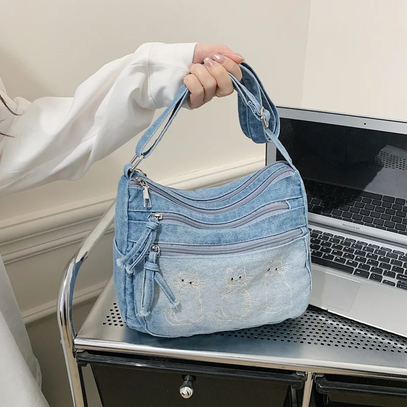 Spring 2026 new high-end embroidery casual washed denim Korean fashion shoulder bag
Spring 2026 new high-end embroidery casual washed denim Korean fashion shoulder bag