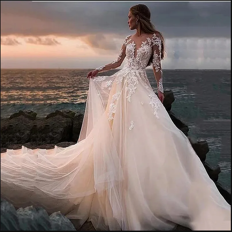 Boho Beach A Line Wedding Dress Illusion Long Sleeves Tulle Sexy Bridal Gowns Appliques Lace Sheer Scoop Neck Fairy Bride Dresse
Boho Beach A Line Wedding Dress Illusion Long Sleeves Tulle Sexy Bridal Gowns Appliques Lace Sheer Scoop Neck Fairy Bride Dresse