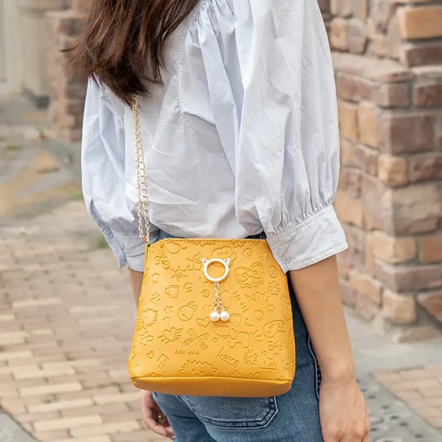 Faux Pearl Decor Bow Embossed Bucket Bag, Faux Leather Shoulder Bag With Adjustable Strap
Faux Pearl Decor Bow Embossed Bucket Bag, Faux Leather Shoulder Bag With Adjustable Strap