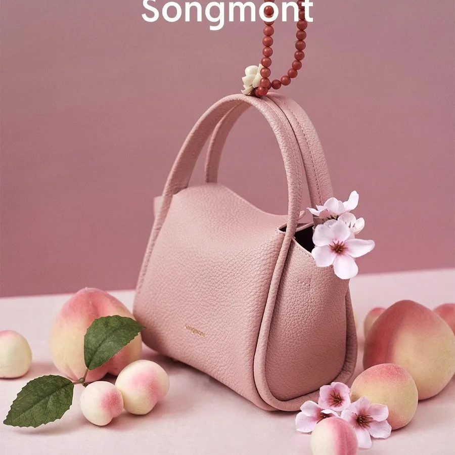Songmont Mini Yuan Bao Bag, Top Grain Leather Crossbody with Top Handle, Unique Small Purse
Songmont Mini Yuan Bao Bag, Top Grain Leather Crossbody with Top Handle, Unique Small Purse