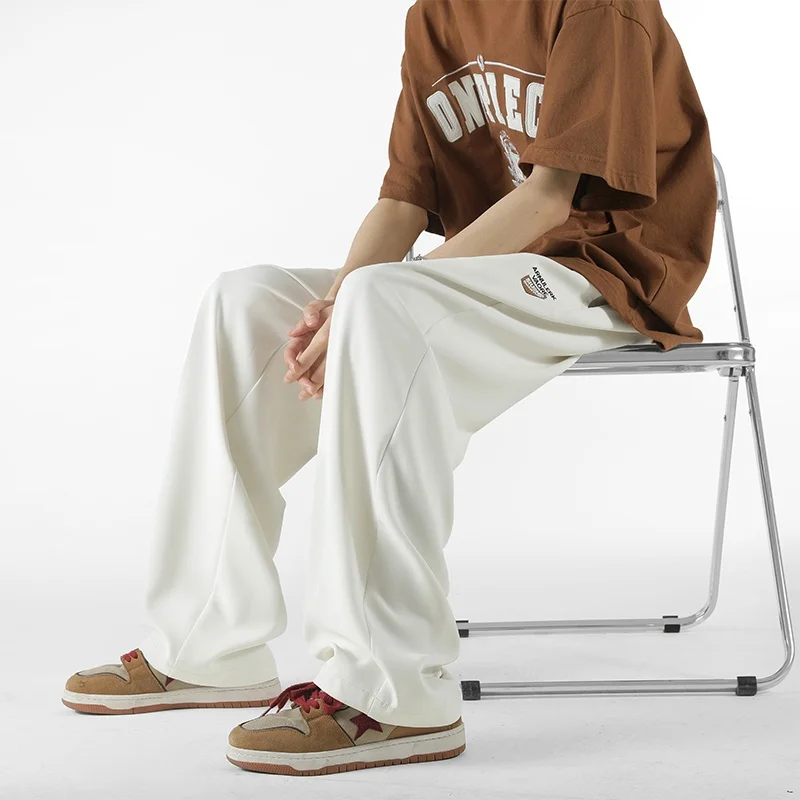 Мужские широкие брюки из ледяного шелка, белые, летние, тонкие, повседневные, прямые, спортивные, свободные, в пол, модные, молодежные
Мужские широкие брюки из ледяного шелка, белые, летние, тонкие, повседневные, прямые, спортивные, свободные, в пол, модные, молодежные