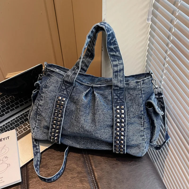 Джинсовая сумка с заклепками, модный универсальный дизайн, сумка через плечо, вместительная дорожная сумка для поездок на работу
Джинсовая сумка с заклепками, модный универсальный дизайн, сумка через плечо, вместительная дорожная сумка для поездок на работу