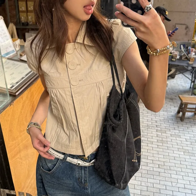 2026 Summer New Chic Korean Style Short Sleeve Doll Collar Double Button Light Asian Wind Retro Feel Women's Shirt Top
2026 Summer New Chic Korean Style Short Sleeve Doll Collar Double Button Light Asian Wind Retro Feel Women's Shirt Top