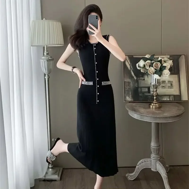 New Summer Elegant Slim Dress WomenFrench Beaded Sleeveless O-neck Single Breasted Pleated Knitted Dresses Midi Vestidos
New Summer Elegant Slim Dress WomenFrench Beaded Sleeveless O-neck Single Breasted Pleated Knitted Dresses Midi Vestidos