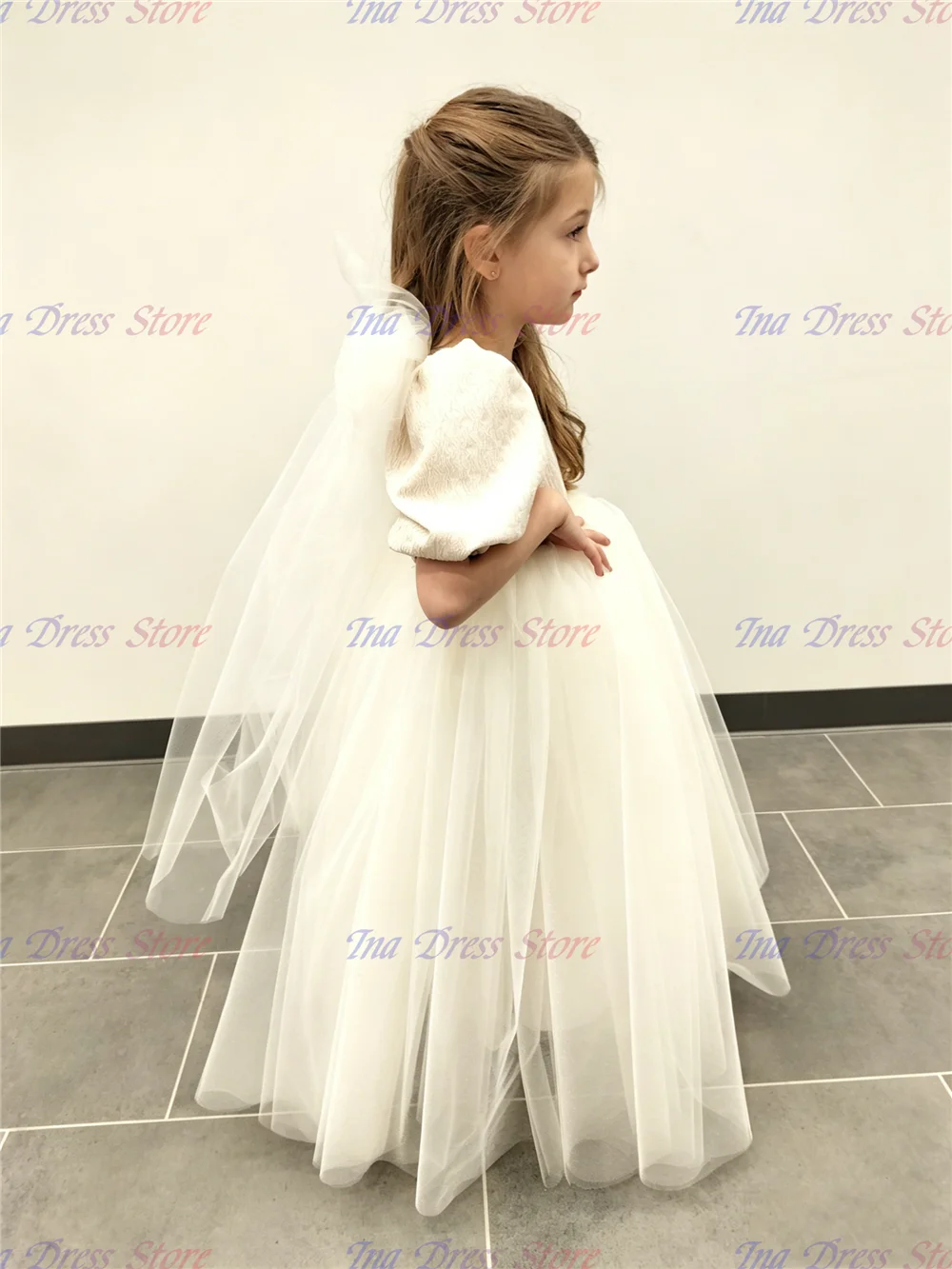 Quality Lovely Ivory Tulle Flower Girl Dress for Wedding with Bow Knee Length Girls First Communion Kids Birthday Party Gowns
Quality Lovely Ivory Tulle Flower Girl Dress for Wedding with Bow Knee Length Girls First Communion Kids Birthday Party Gowns