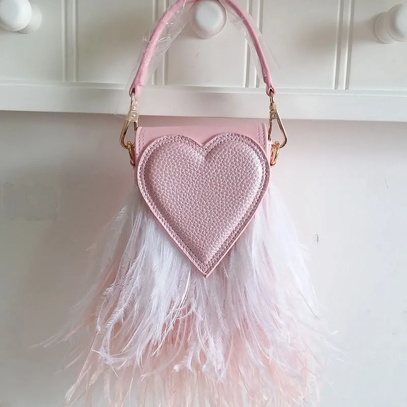 Осенне-зимние вечерние сумки с кисточками из страусиных перьев для женщин, роскошные маленькие сумки ручной работы в форме сердца, сумка на плечо для выпускного вечера Femme
Осенне-зимние вечерние сумки с кисточками из страусиных перьев для женщин, роскошные маленькие сумки ручной работы в форме сердца, сумка на плечо для выпускного вечера Femme