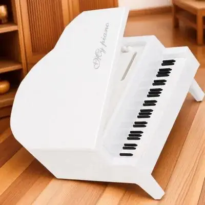 Creative White Mini Piano Desktop Ornament ABS Plastic Decor Photo Prop Home Ornament Musical Instrument Adornment
Creative White Mini Piano Desktop Ornament ABS Plastic Decor Photo Prop Home Ornament Musical Instrument Adornment
