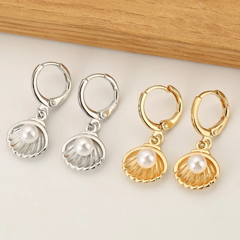 New Ocean Style Shell Pearl Ear Buckle Personality Fashion Design ins Earrings Premium Temperament Earrings
New Ocean Style Shell Pearl Ear Buckle Personality Fashion Design ins Earrings Premium Temperament Earrings