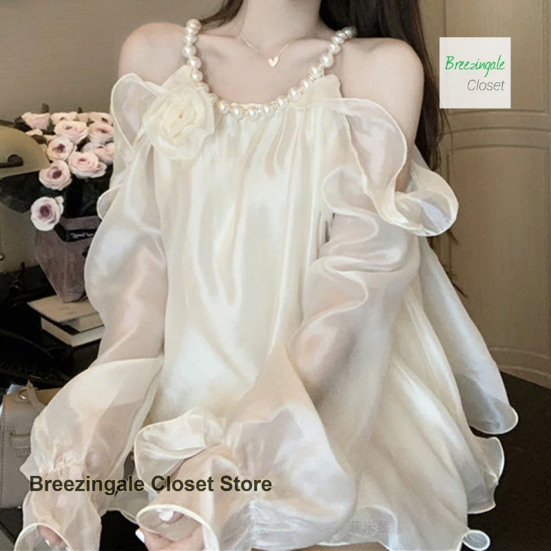 French socialite flower pearl hanging neck chiffon shirt top for women's summer new style temperament loose casual shirt
French socialite flower pearl hanging neck chiffon shirt top for women's summer new style temperament loose casual shirt