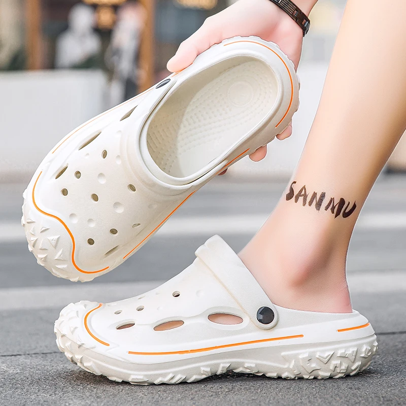 Популярная обувь больших размеров с отверстиями, садовая обувь, мужские сандалии с росписью, как пляжные тапочки.
Популярная обувь больших размеров с отверстиями, садовая обувь, мужские сандалии с росписью, как пляжные тапочки.