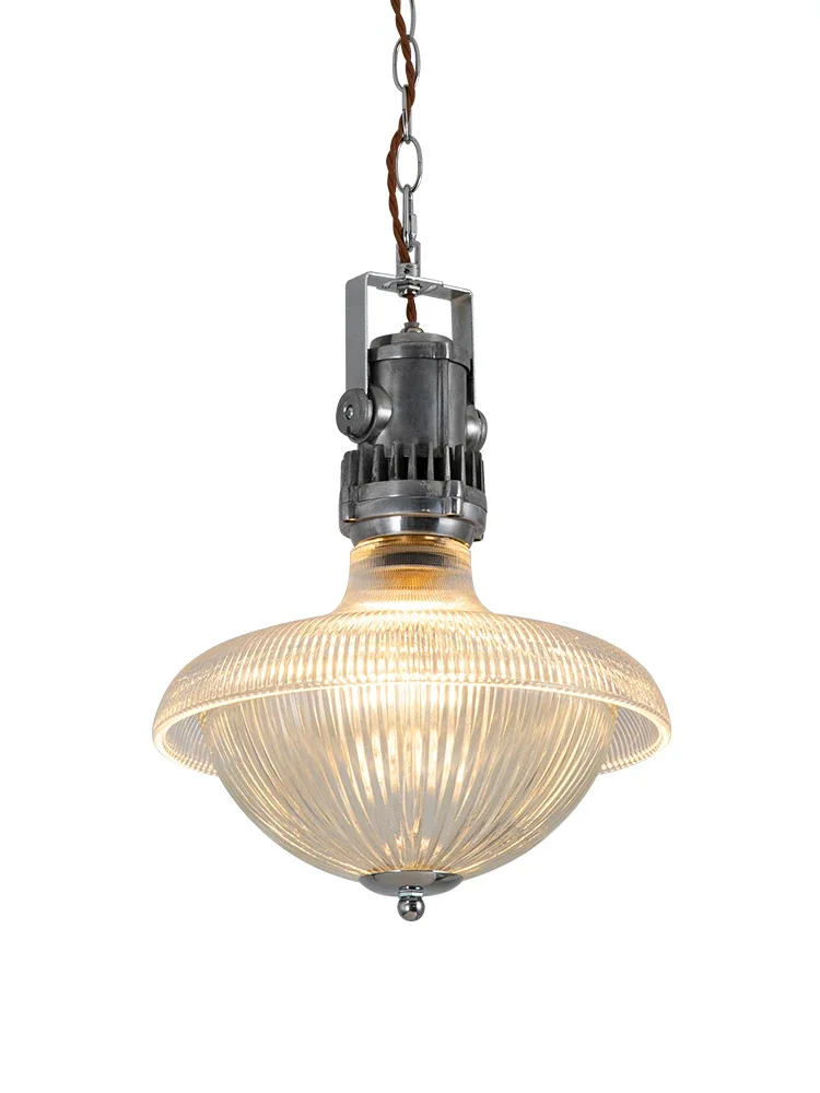 French retro restaurant small chandelier glass shade American industrial style brass Japanese medieval chandelier above the bar
French retro restaurant small chandelier glass shade American industrial style brass Japanese medieval chandelier above the bar