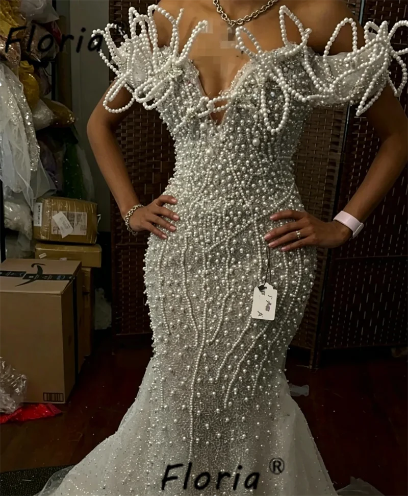 Modest Ivory Pearls Dubai Wedding Dress 4D Appliques Luxury Beads Bridal Gown Customized Formal Occasion Vestidos de noche Gala
Modest Ivory Pearls Dubai Wedding Dress 4D Appliques Luxury Beads Bridal Gown Customized Formal Occasion Vestidos de noche Gala