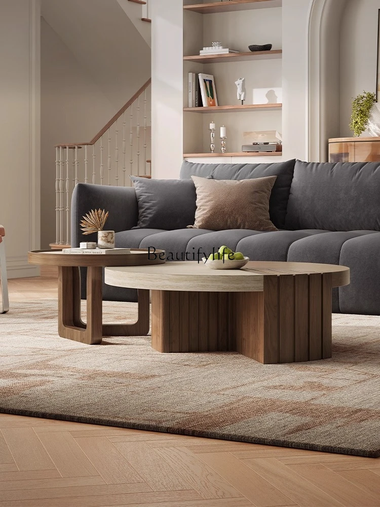 Wabi Sabi wind round coffee table living room household small apartment medium and ancient style travertine coffee table
Wabi Sabi wind round coffee table living room household small apartment medium and ancient style travertine coffee table