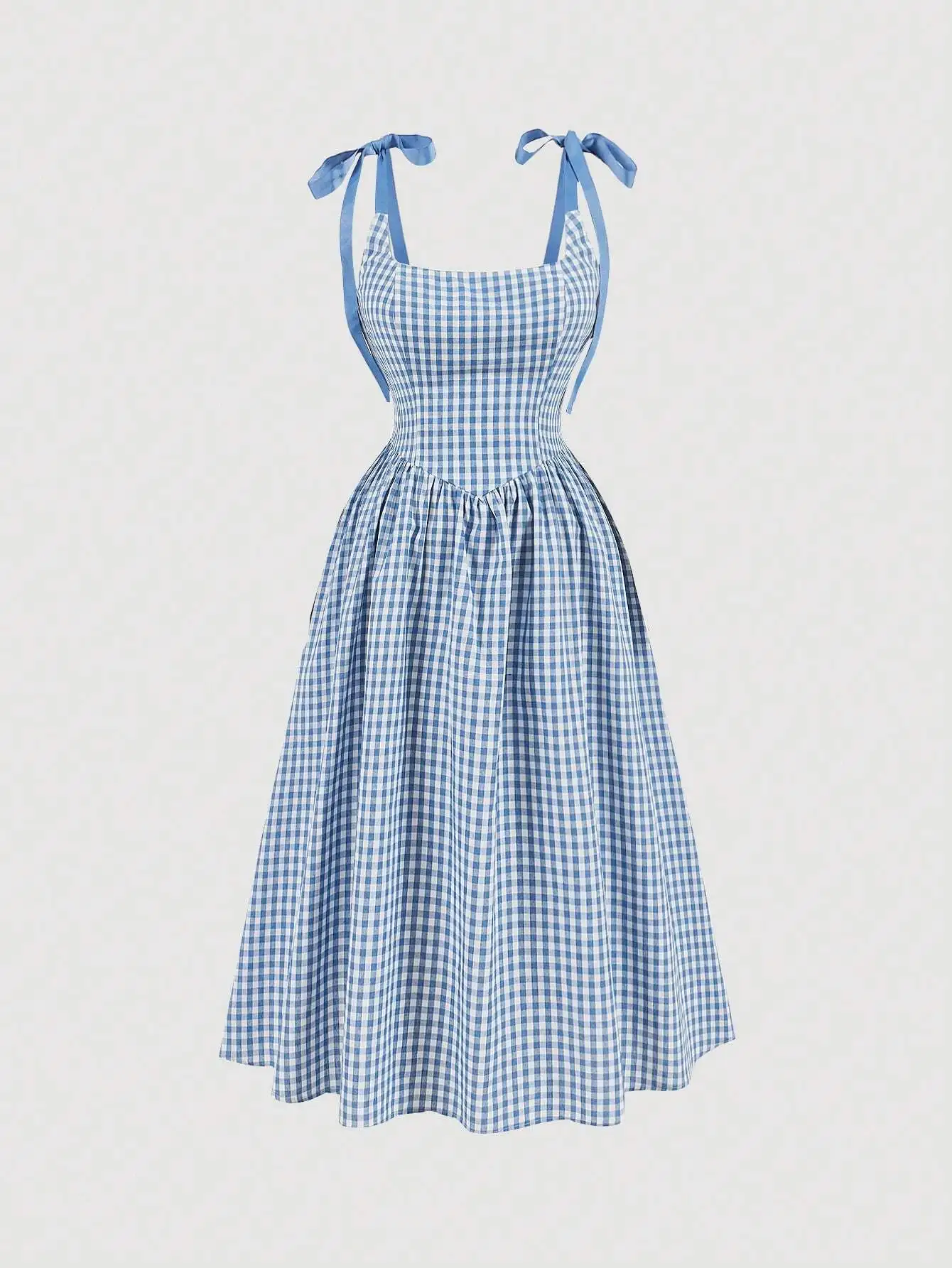 Сине-белое платье миди в клетку с регулируемыми бретелями на плечах
Сине-белое платье миди в клетку с регулируемыми бретелями на плечах