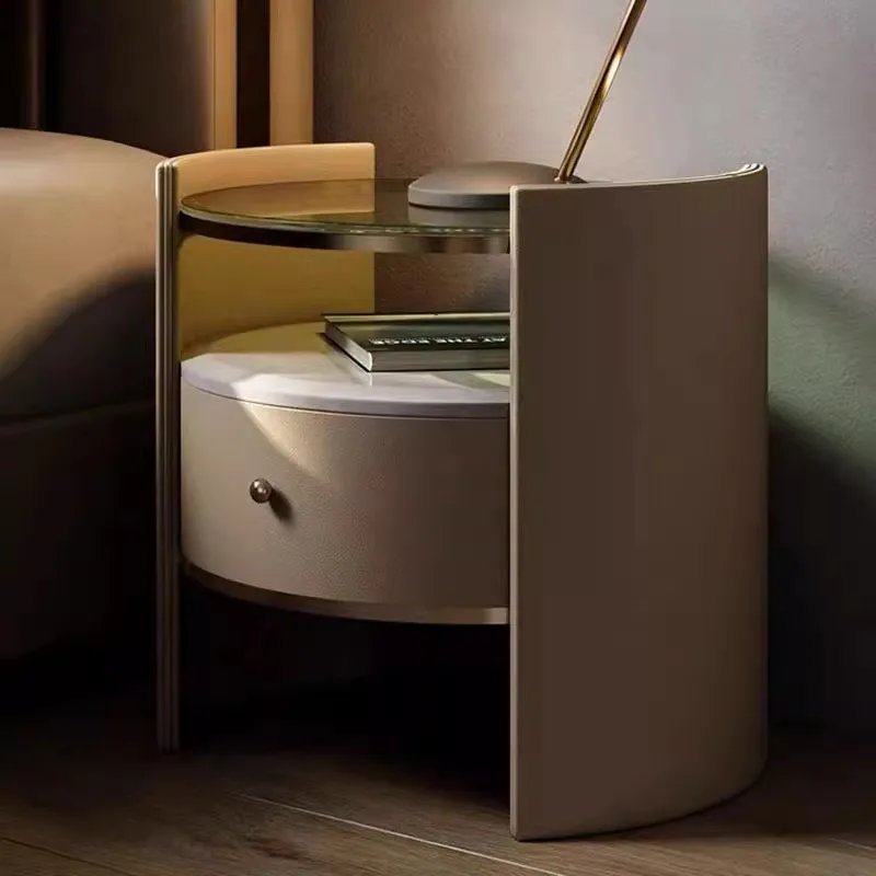 Light luxury Italian designer round glass high-end natural marble minimalist bedside cabinet
Light luxury Italian designer round glass high-end natural marble minimalist bedside cabinet