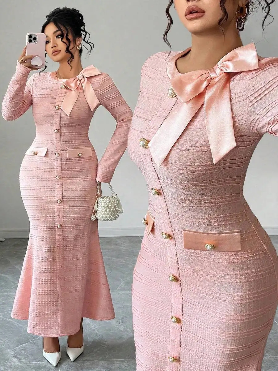 Pink Textured Knit Long Sleeve Mermaid Dress with Pearl Buttons & Bow Neck
Pink Textured Knit Long Sleeve Mermaid Dress with Pearl Buttons & Bow Neck
