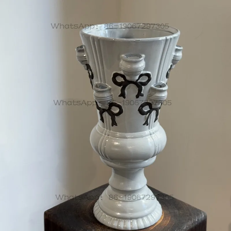 Handmade relief bow vase 30cm * 16cm
Handmade relief bow vase 30cm * 16cm