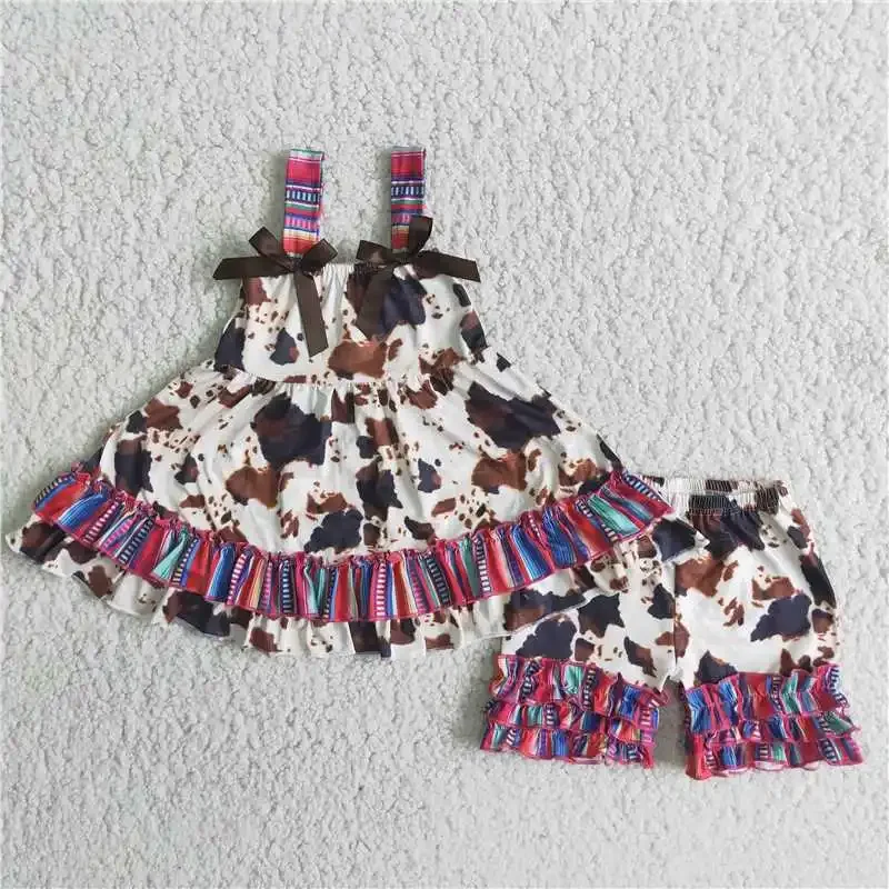 Wholesale Price Summer children's clothing ink pattern shoulder strap bow colorful striped top Lace shorts girl boutique suit
Wholesale Price Summer children's clothing ink pattern shoulder strap bow colorful striped top Lace shorts girl boutique suit