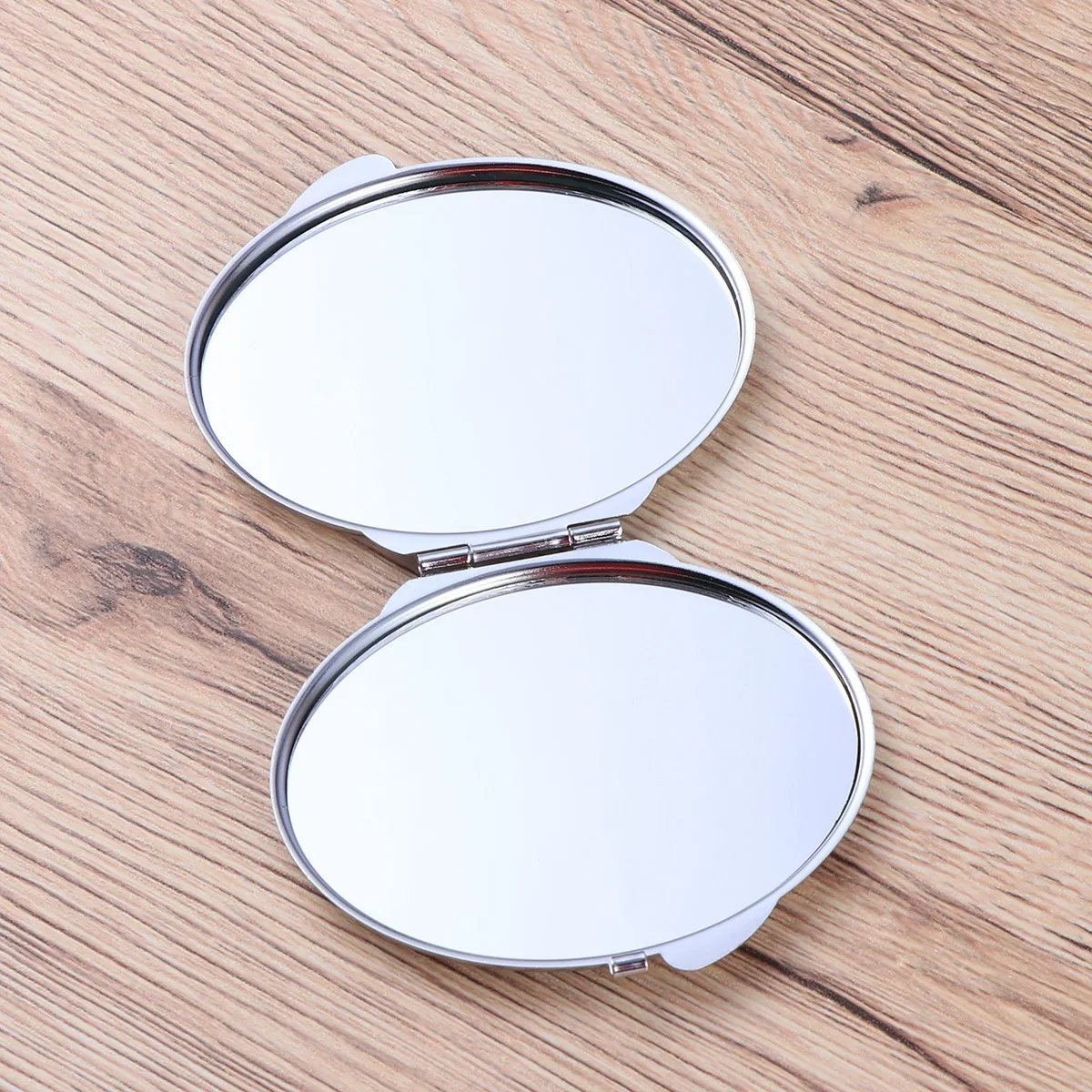 Compact Oval Makeup Mirror Foldable Design Double Sided Stainless Steel Portable Mirror for Travel and Daily Use
Compact Oval Makeup Mirror Foldable Design Double Sided Stainless Steel Portable Mirror for Travel and Daily Use