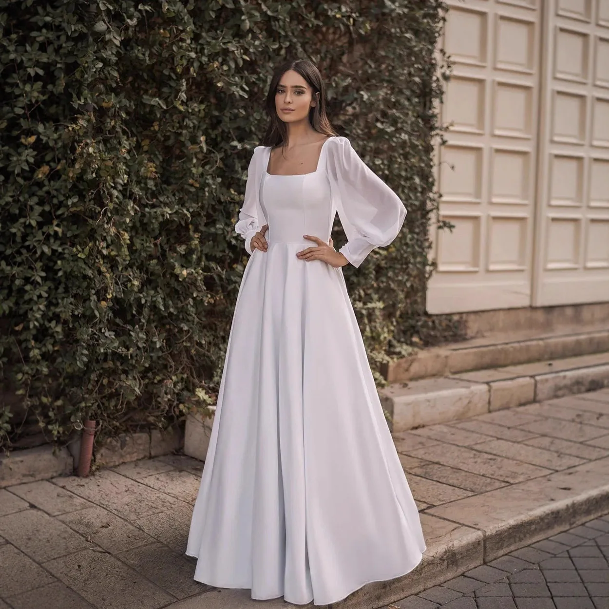 White Long Sleeve Square Collar Slim Fit Wedding Dress Backless Design Floor Length Engagement Evening Gown Chinese Production
White Long Sleeve Square Collar Slim Fit Wedding Dress Backless Design Floor Length Engagement Evening Gown Chinese Production