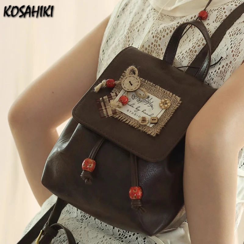 Японская лоскутная клетчатая сумка на плечо Kawaii на пуговицах, повседневные модные винтажные сумки Y2k, эстетические универсальные мини-рюкзаки для женщин
Японская лоскутная клетчатая сумка на плечо Kawaii на пуговицах, повседневные модные винтажные сумки Y2k, эстетические универсальные мини-рюкзаки для женщин