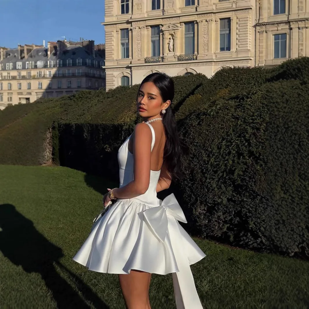 White Elegant 3d Bow Backless Mini Dress for Women Fashion Sling A-line Pleated Vestidos Spring Summer Lady Party Evening Gown
White Elegant 3d Bow Backless Mini Dress for Women Fashion Sling A-line Pleated Vestidos Spring Summer Lady Party Evening Gown