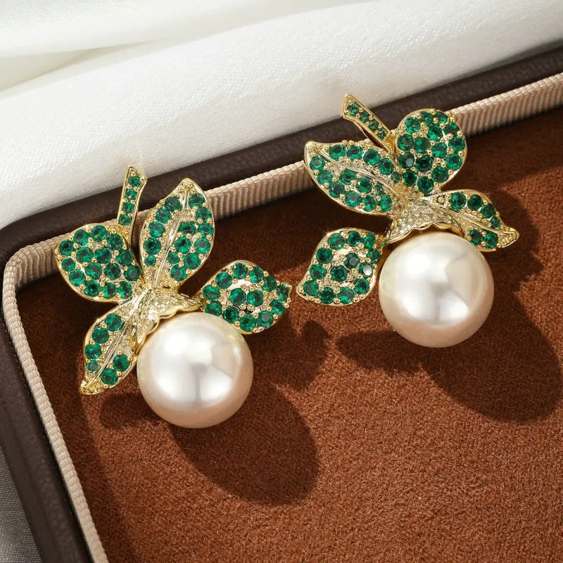 Женские серьги Bilincolor с зеленым листом и синтетическим жемчугом
Женские серьги Bilincolor с зеленым листом и синтетическим жемчугом