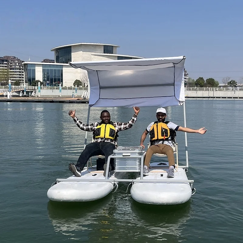 Portable Electric 2 Person Inflatable Catamaran Fishing Pontoon Boat for Water Game & Water Party with sunshade(Customized)
Portable Electric 2 Person Inflatable Catamaran Fishing Pontoon Boat for Water Game & Water Party with sunshade(Customized)