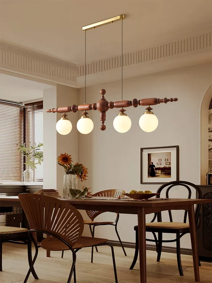 American retro dining table strip lamp medieval wabi wind chandelier Japanese French restaurant bar solid wood chandelier lamp
American retro dining table strip lamp medieval wabi wind chandelier Japanese French restaurant bar solid wood chandelier lamp