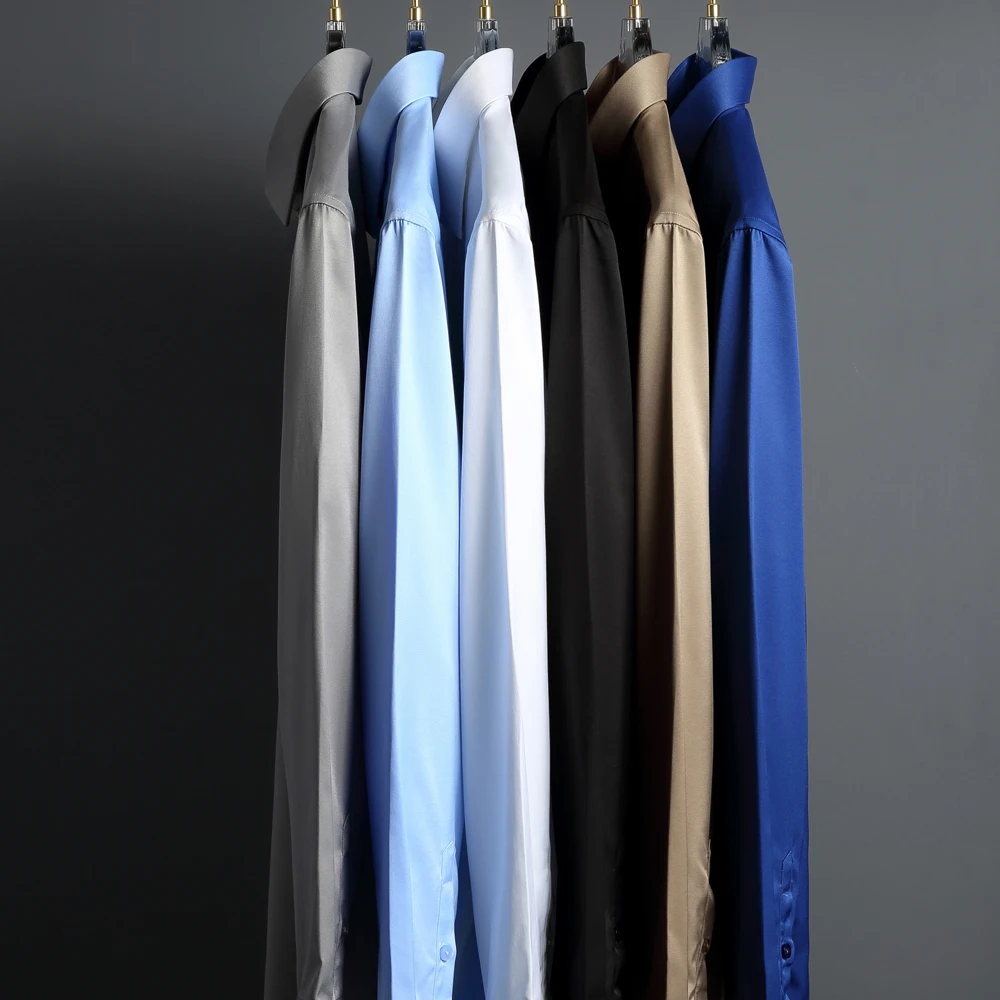 Мужские классические рубашки, однотонные эластичные рубашки с длинными рукавами без морщин, официальная рубашка стандартного кроя, свадебные деловые повседневные рубашки на пуговицах
Мужские классические рубашки, однотонные эластичные рубашки с длинными рукавами без морщин, официальная рубашка стандартного кроя, свадебные деловые повседневные рубашки на пуговицах